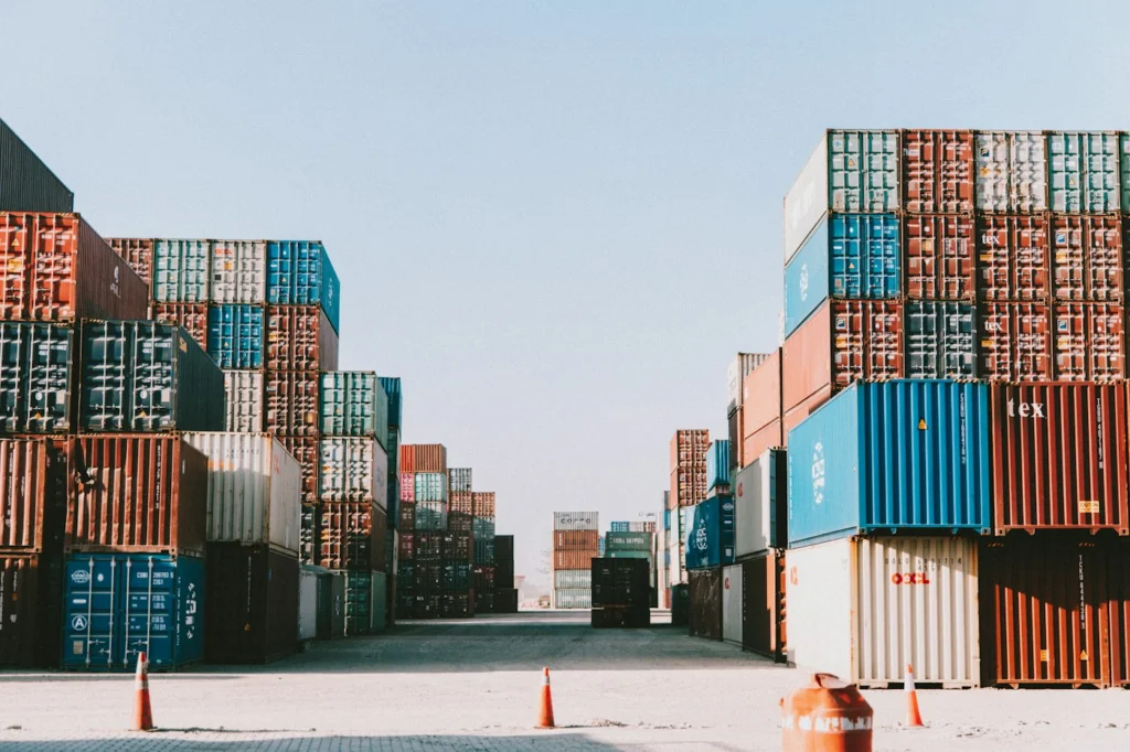 Row of stacked shipping containers in a depot